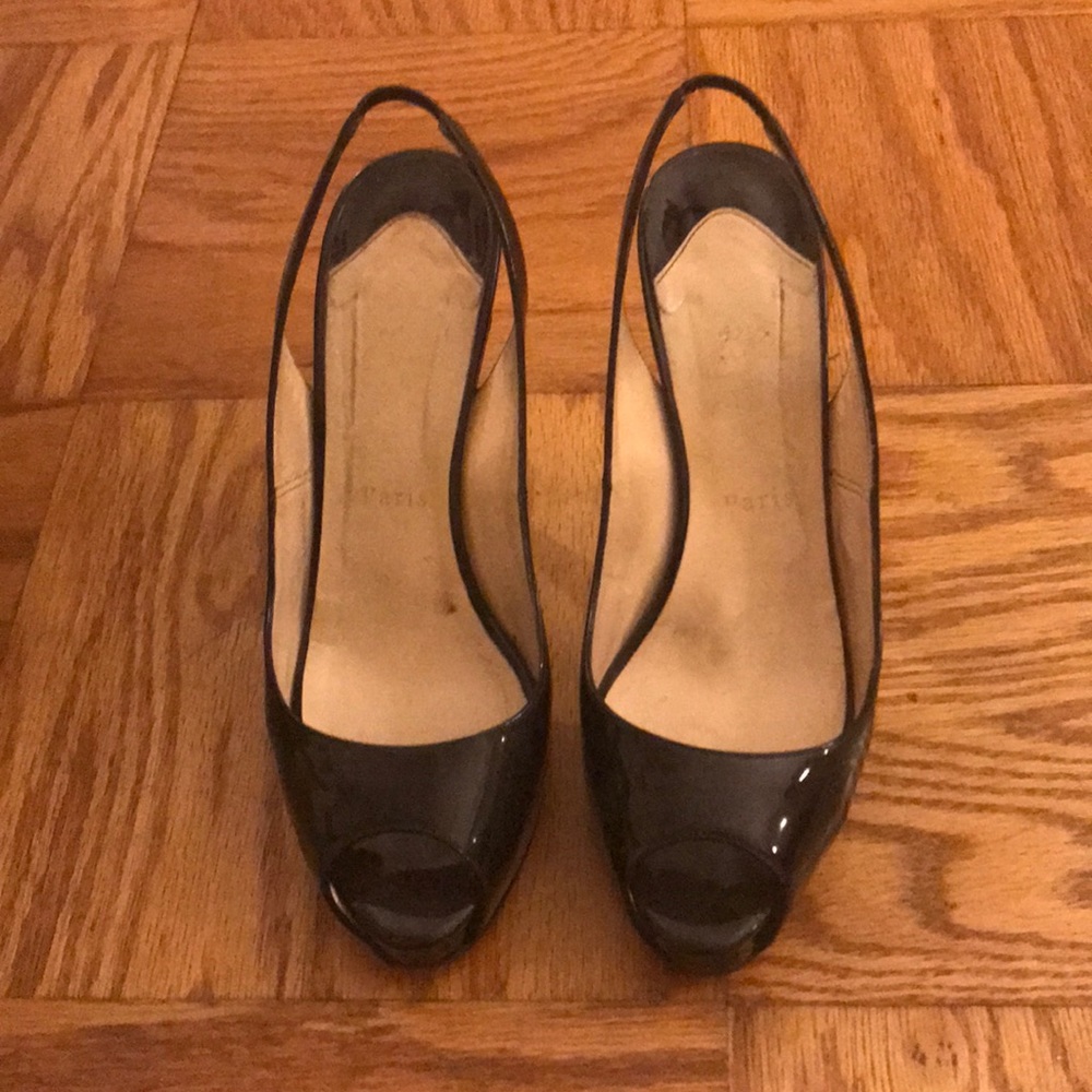 Black peep toe sling back pumps